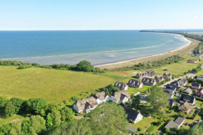 strandnah mit Balkon, gratis Nutzung vom AHOI Erlebnisbad und Sauna in Sellin - Strandhaus Mönchgut FeWo13 in Middelhagen